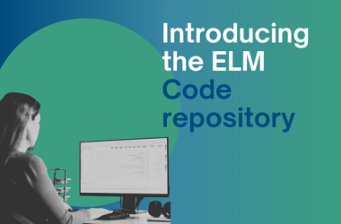 Person looking at the computer and coding.