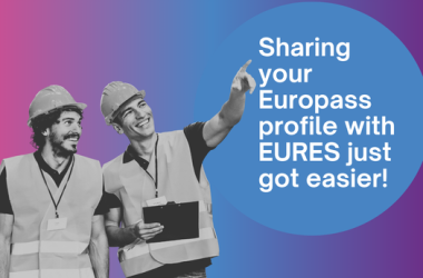 Two men with one of them pointing at something ahead of them